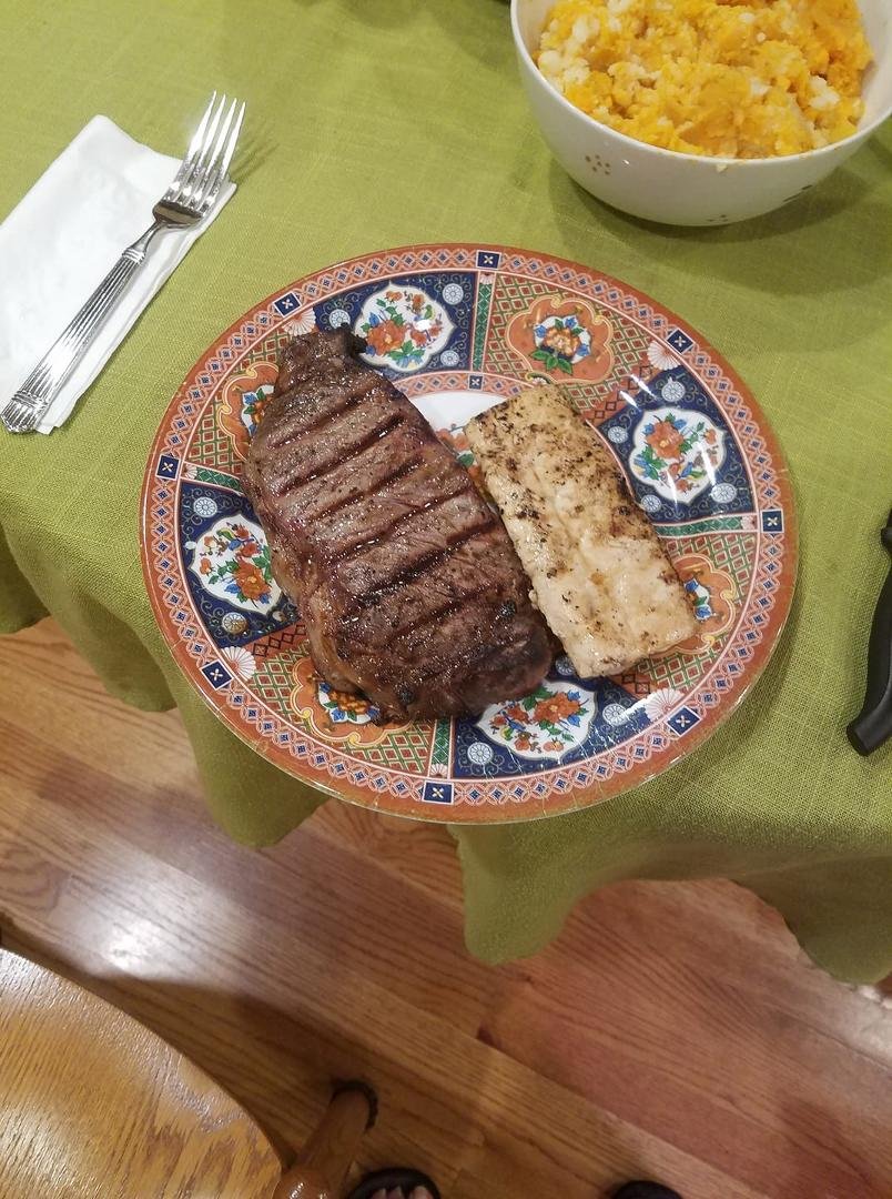 Surf and turf for dinner. Steak and mahi mahi cooked to perfection on the grill