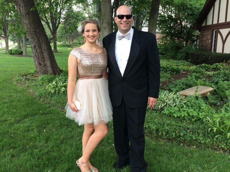 Ken escorting Taygen to her eighth grade dance.