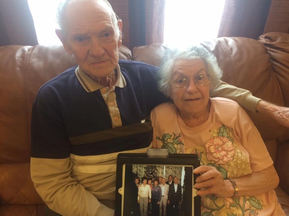 Dad looking at Brenda Register Fuqua post on FB