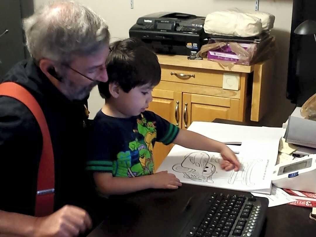 Before supper tonight I was playing with Caden down in the playroom. After supper he wanted me to go down there and play with him again. I told him I had homework to do. He told me he had homework to do also. He went an