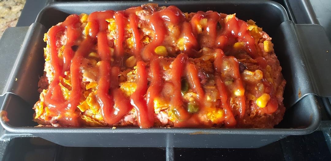 I just put together Stephen's favorite Southwest meatloaf. Looks pretty, hope it taste good. It is a good guess at to what is going to go with it. :)