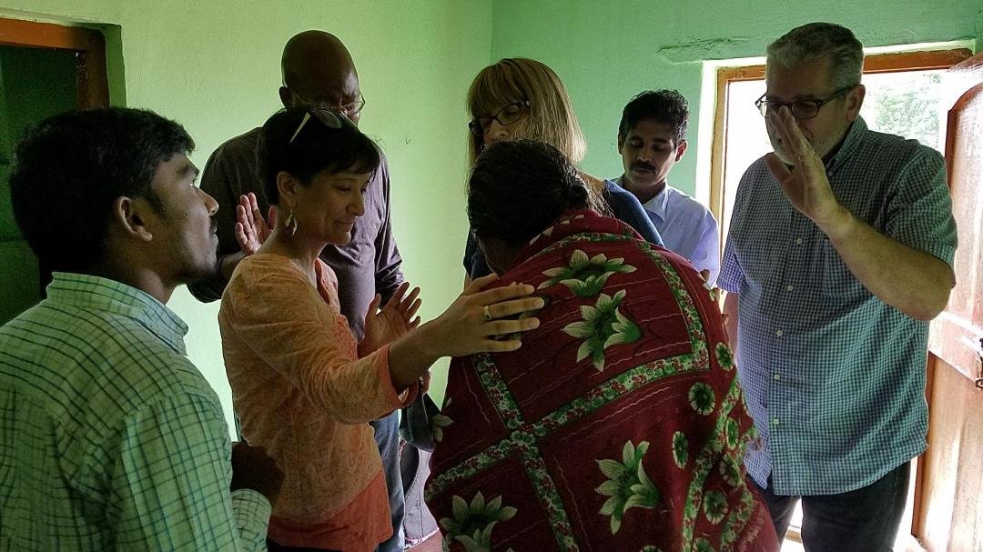 Praying for folks in a village