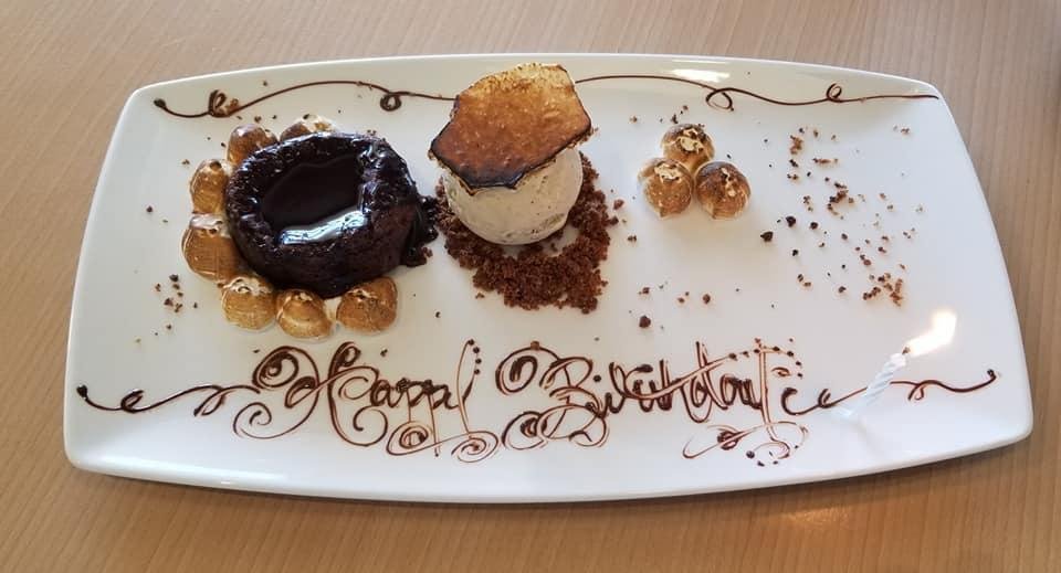 Warm chocolate cake, torched marshmallow, smore gelato, cinnamon graham crumb, chocolate ganache