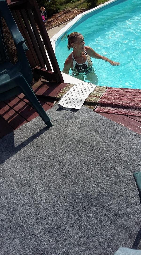 Here is my sister hanging out in the pool after her daughter pushed her in....