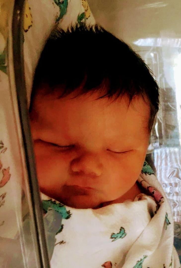 My first grandchild from my youngest son Logan. 
Koda Jacob 9lbs 4oz. He's so adorable as hell