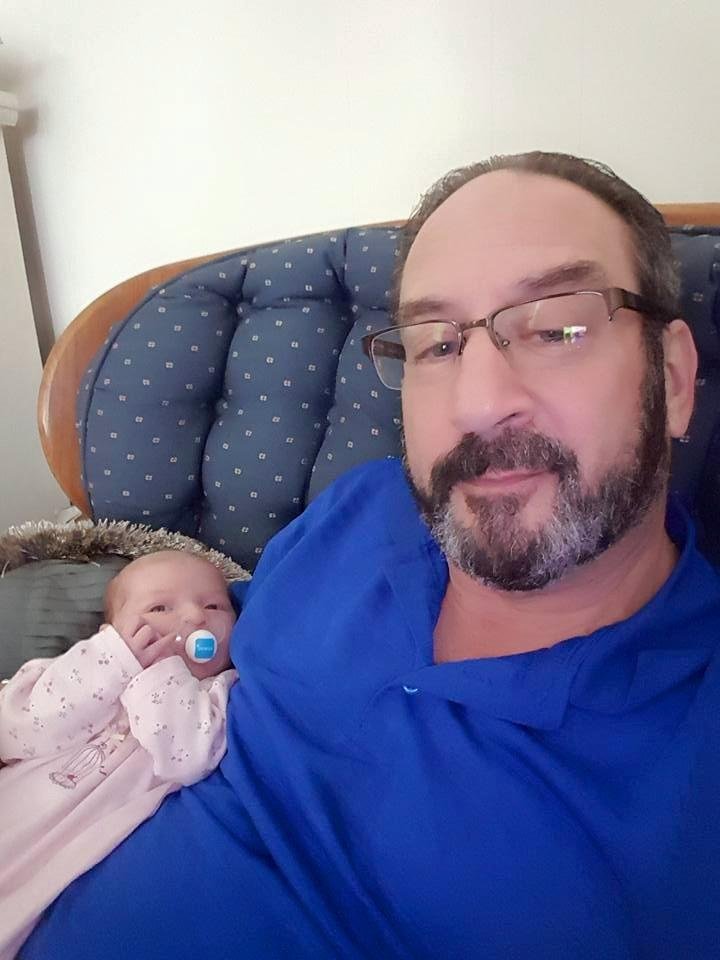 First selfie with my newest granddaughter. Selfies are awkward. I won't be doing this often.