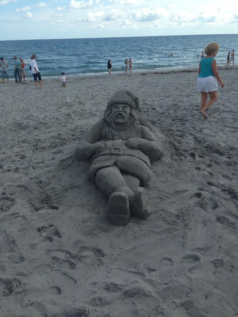 Santa relaxing on the beach ion Delray beach, Fl.