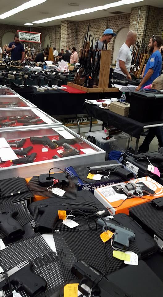 Spent the afternoon at the gun show...time to gear up! Bought an AR-15, ammo and a knife. The pic is just past the entrance, but the place was cavernous and packed with equipment.
