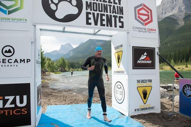 Finishing Canmore Grizzly Open Water Swim Race 2017 for podium medal