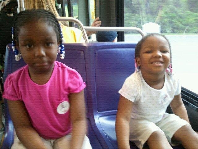 Girls on the bus on the way to Epcot.