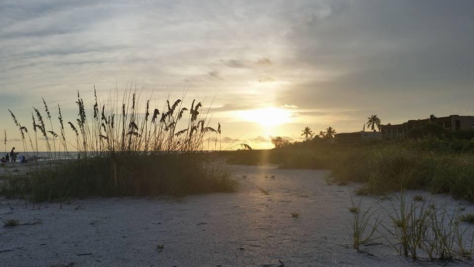 With my lovely wife watching the sun go down in Sanibel Island!!