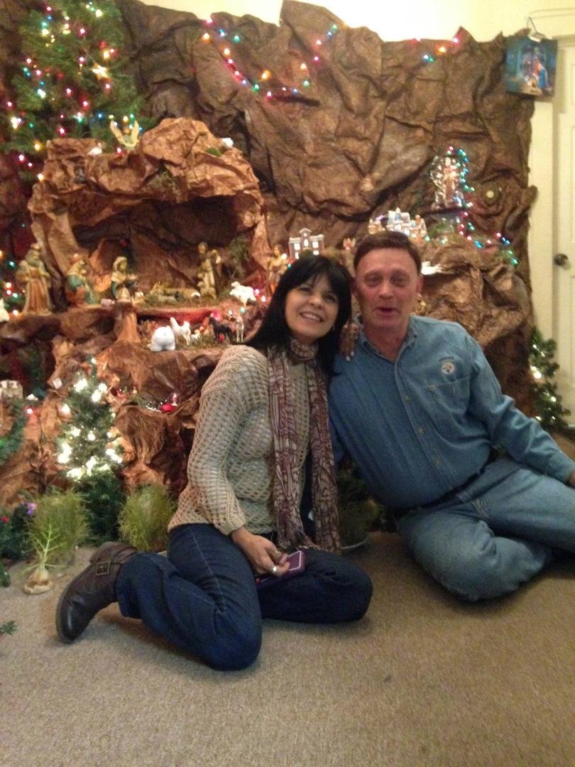 Christmas at friends Joseph & Mary's house. I'm not singing. I think I'm sitting on Christmas decoration.