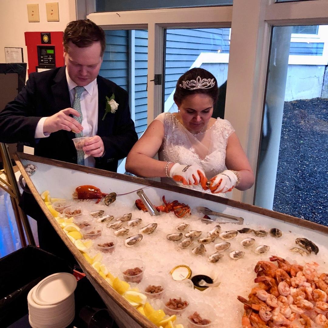 Shucking oysters! Lauren has found a hidden talent for it.