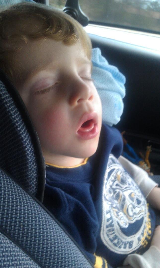 Caleb asleep on way to mountain lake resort