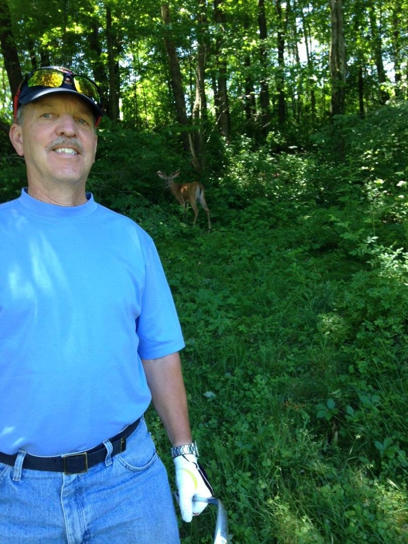We had fun looking for our golf balls, LOL! Look close and see the deer. I photobombed this photo.