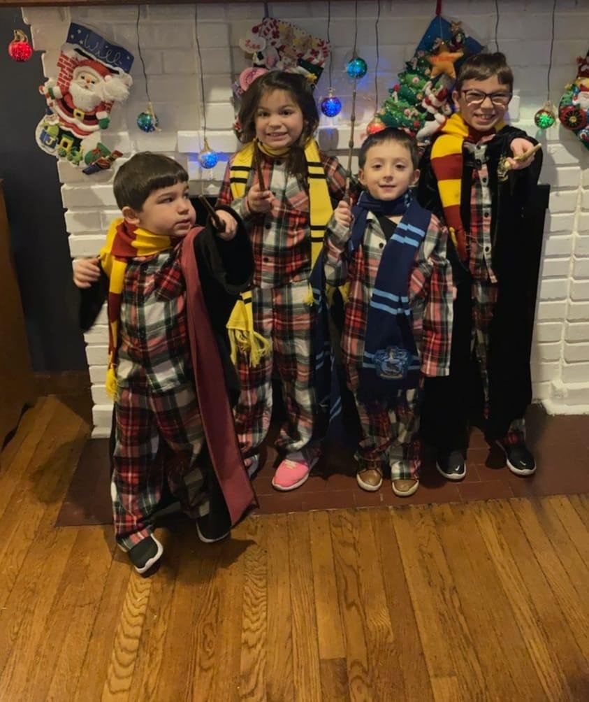My grandchildren had a magical Harry Potter themed Christmas Eve at Hogwarts. After arriving from platform 9 3/4, they went through the sorting hat ceremony, and got their house scarves, one Hufflepuff, two Gryffindor, and