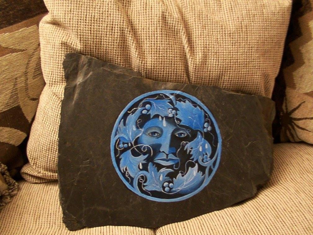 This is my Blue Man. I just found this picture while going through my computer files. Anyway, I saw this idea in a book and loved it, so I painted it on a large piece of shale.