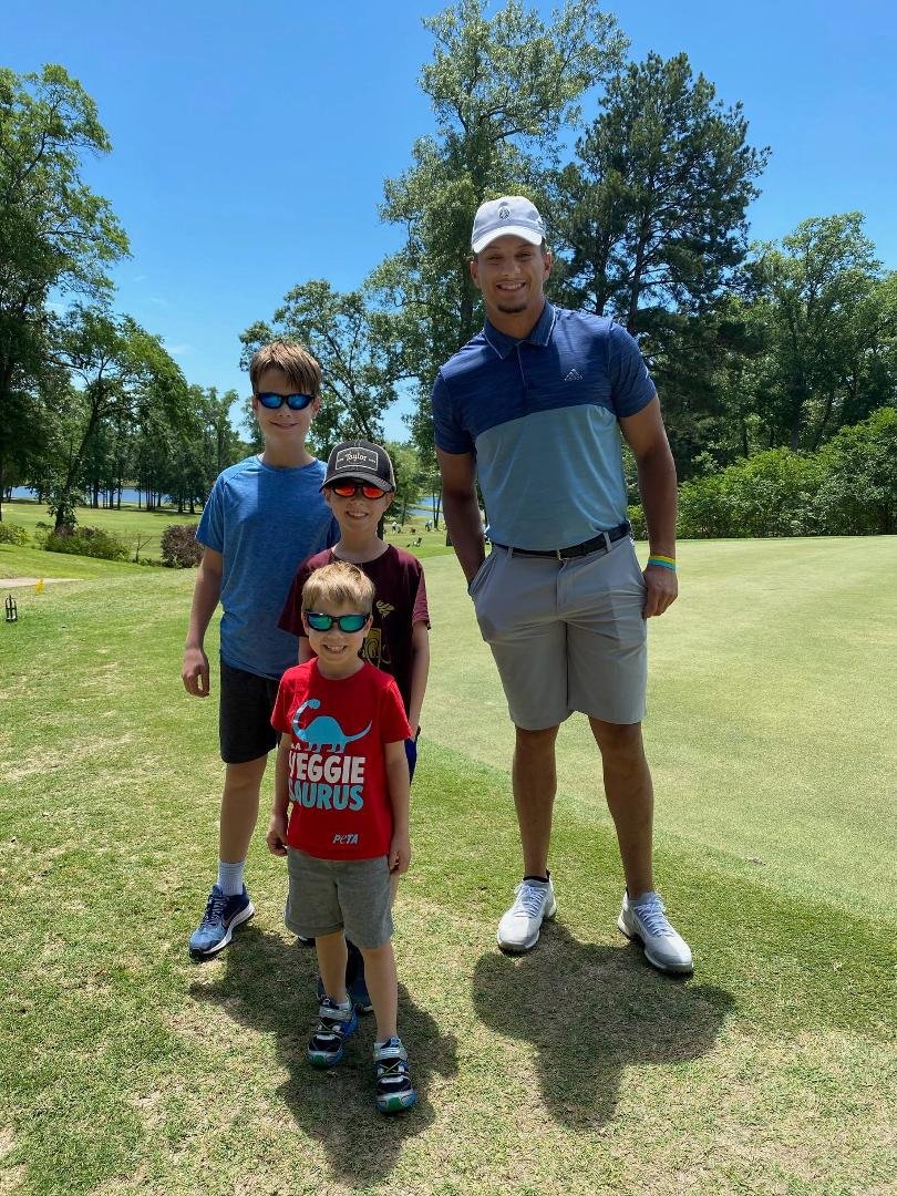 Our grandsons with Patrick Mahomes, Hollytree CC, Tyler TX.