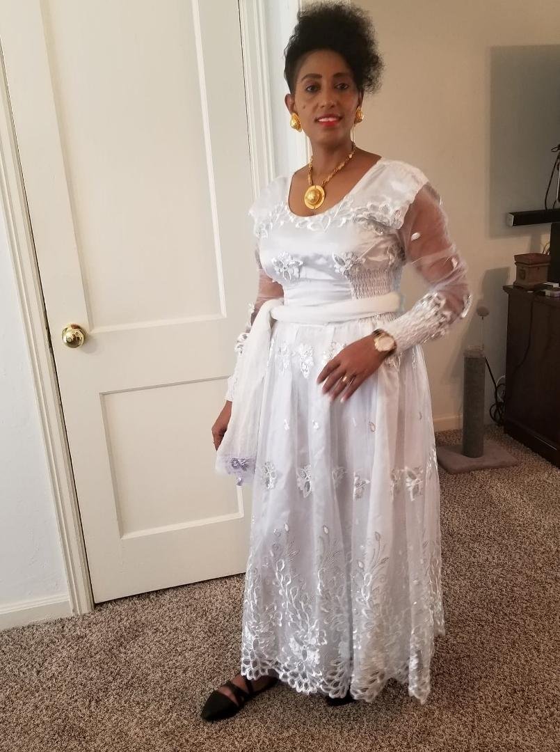 My beautiful wife going to Ethiopian NewYear party again.