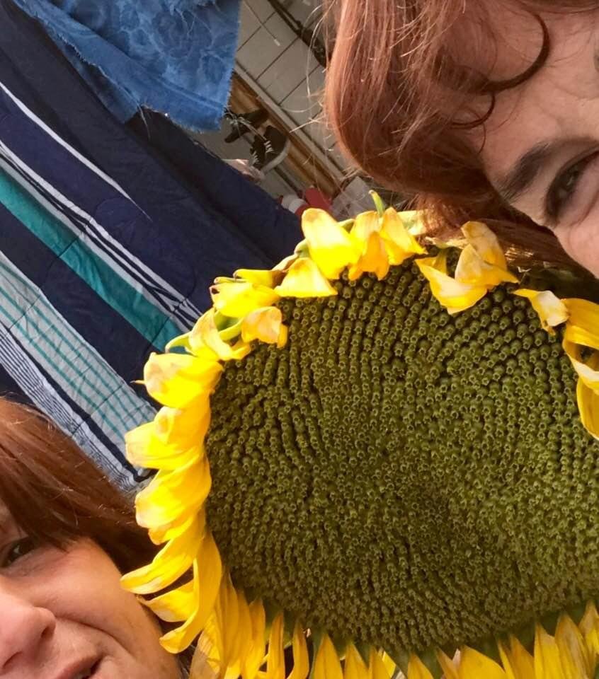 Kristine Harvey & Cindy DeGroot in the sunflower patch in our Backyard! They taste so good and sweet.