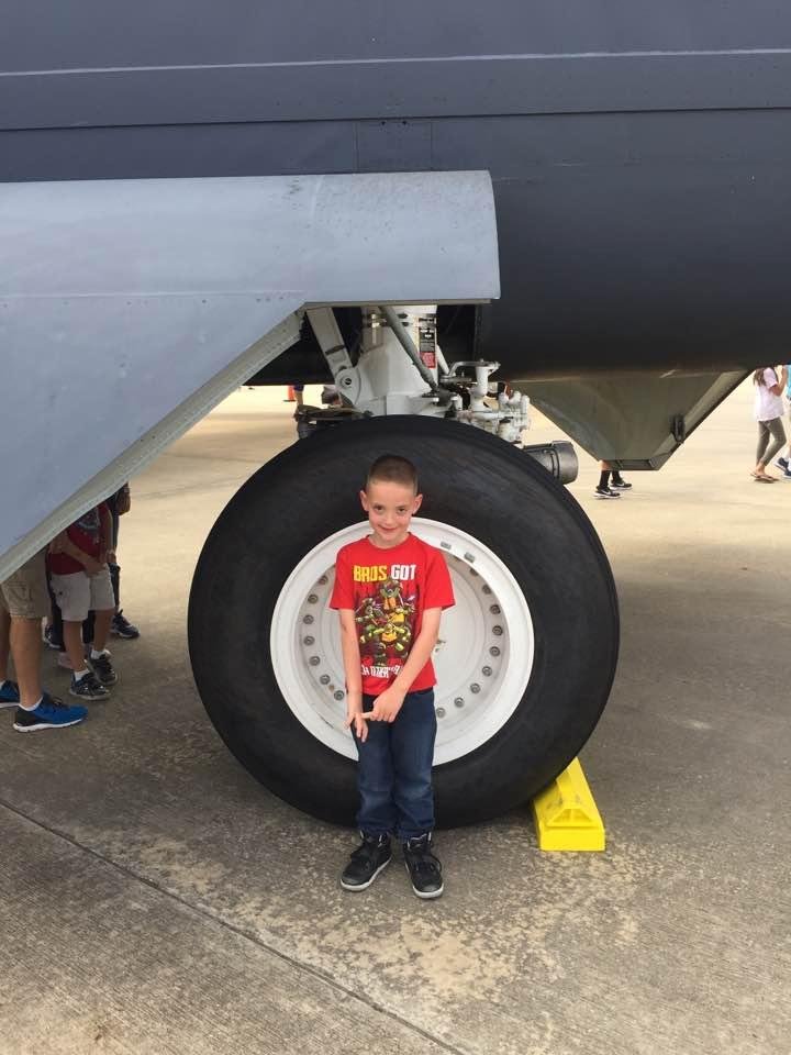 Jacob next to BUFF's landing gear.
