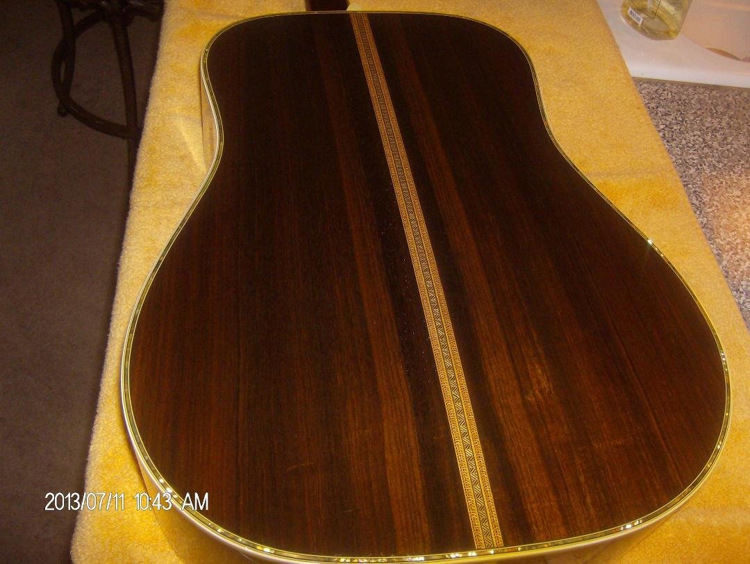 I also made a wider than normal back strip with a top pearl kit on the back as well making what I considered a more elaborate 45 than Martin did!!
And this is how my mind set was back then, I wanted to craft guitars better