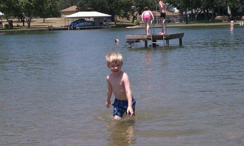 Don't worry folks Grandma was right there making sure sonny didn't go under. Thats Rheadenes head bobing out by the dock.