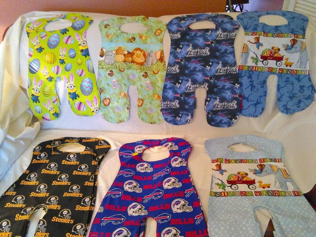 FULL LENGTH BABY BIBS 6 MOS. SIZ VELCRO CLOSURE $15. MESSAGE ME IF INTERESTED.