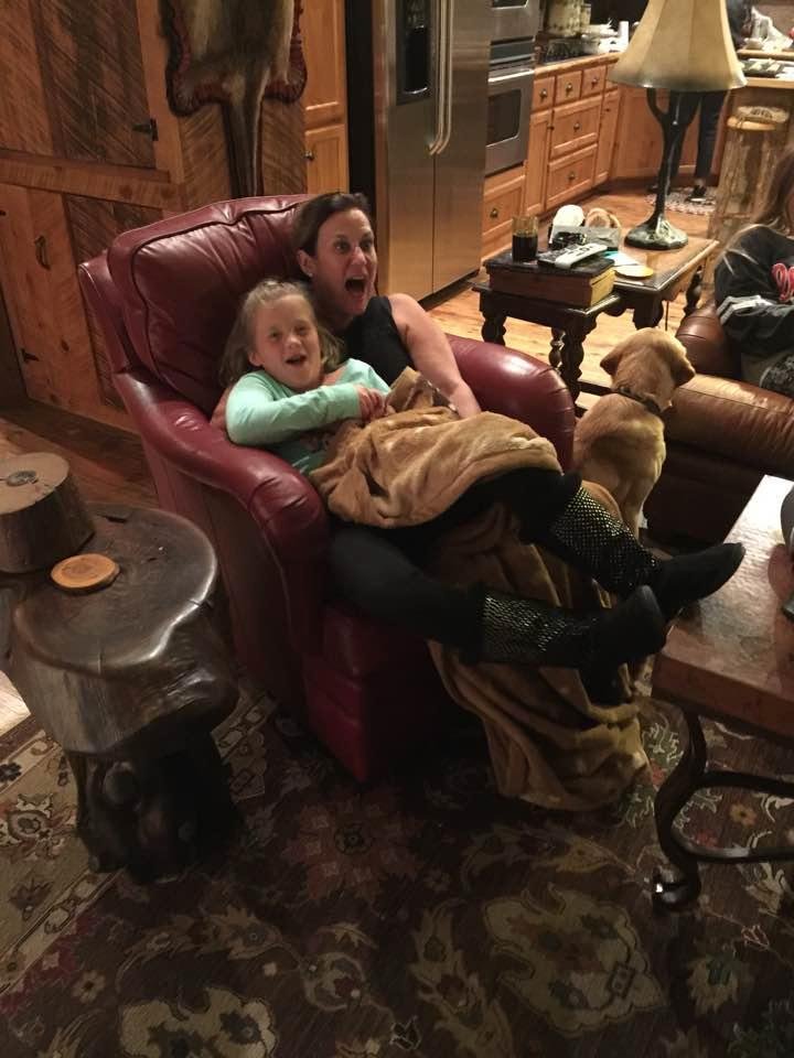 Jane and Morgan watching a scary movie at the Lazy D.