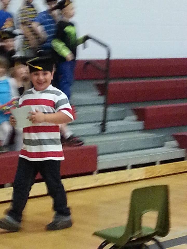 Chris right after he got his diploma, happy as can be. Love Auntie Wee