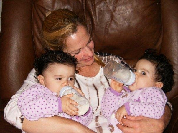 Margie with our God daughters, twins Hanna and Reina