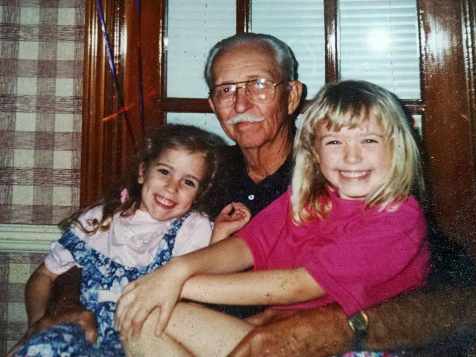 Katelyn Jones Hickman with her cousin Carly Smith Hohl sitting in Grandaddy Ansel's lap. Happy birthday to my sweet little girl.