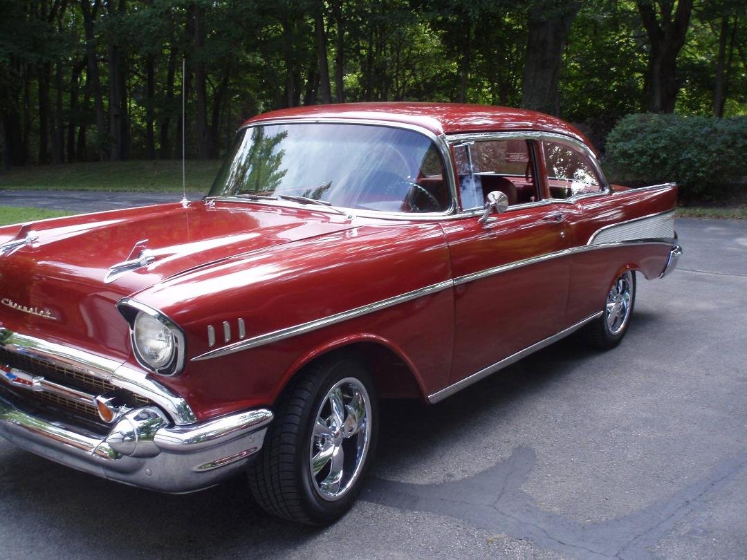 Weather is just right to be riding around in a 1957 Chevy Belair