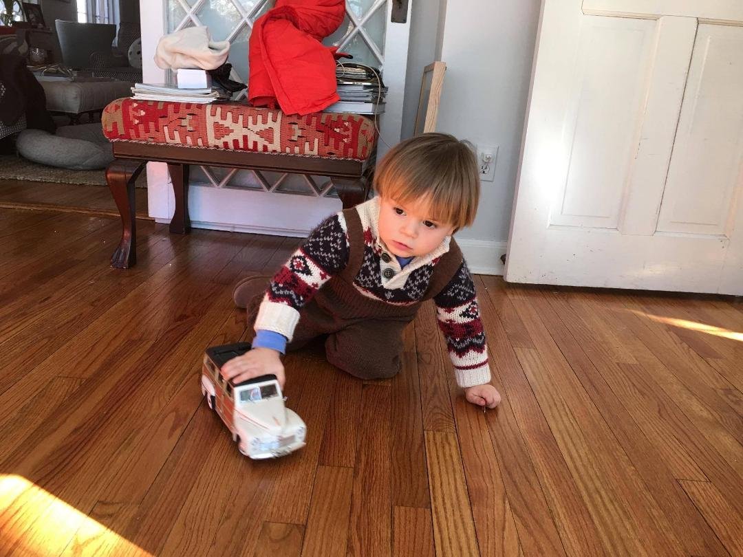 Theo having fun while visiting Uncle Mike and Aunt Nancy.