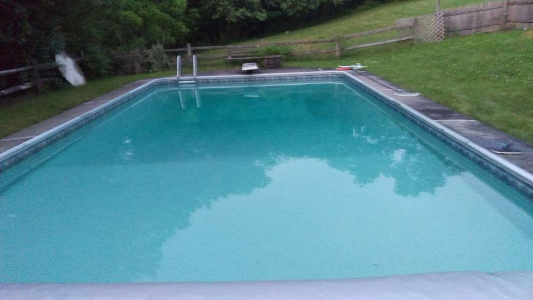 Quite a challenge getting the pool open this spring. Every time I drained the water off of the winter cover it rained again. Finally got it opened last Friday. It's now crystal clear. Solar cover went on today. Will be swim