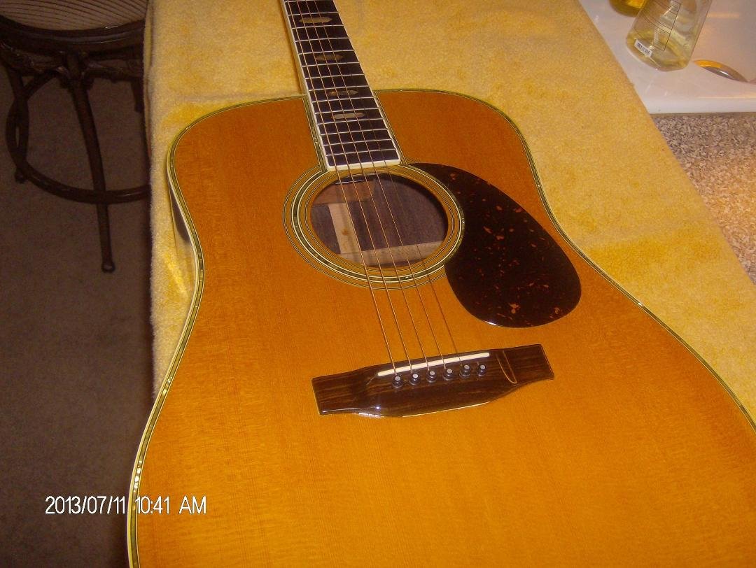 Here's a recent pick of a D-45 custom Rippee guitar! The first custom acoustic guitar I crafted back in the late 1970's! I wanted to hit a home run with my first guitar. And it really exceeded my expectations!
She has a cho