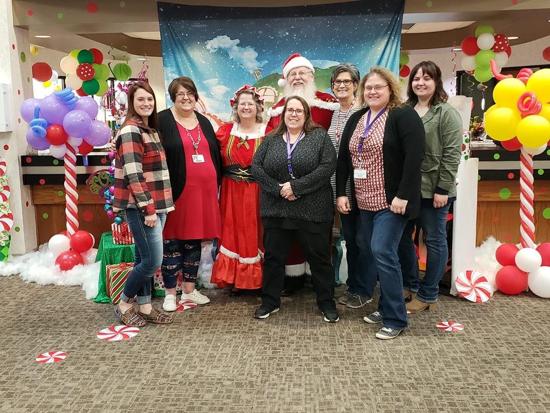 Some of the cool people with whom I work. Oh, and Mrs. & Mr. Claus. 😉🎄