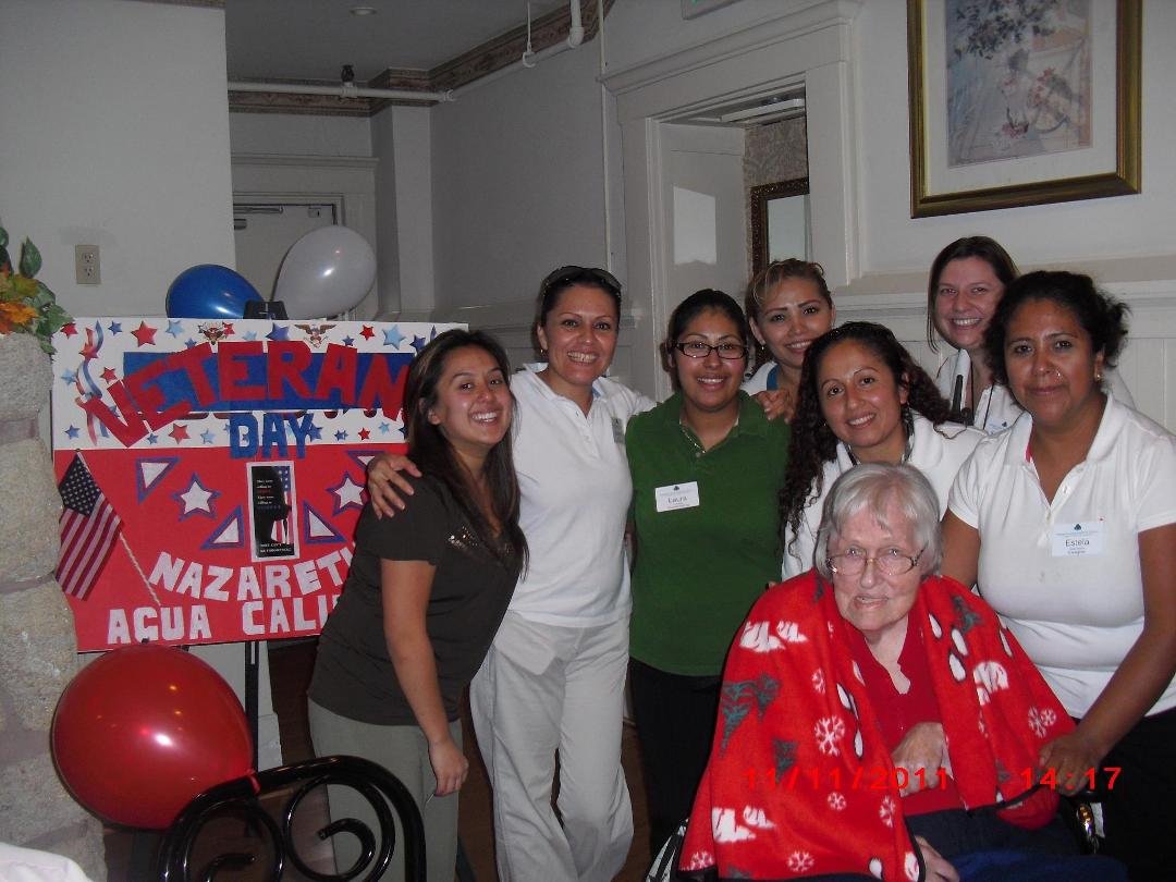My Mom in her new place. She is surrounded by her caregivers
