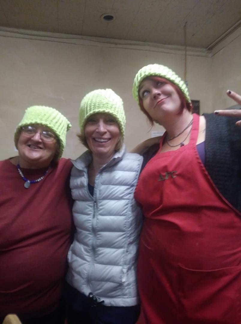 Kathy, Megan. and another volunteer at Lighthouse