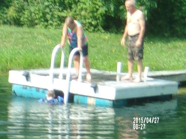fun at the cabin yesterday-shelly&brian---catie-jake and joey plus rob and me-fishing was good food was great and swimming was like in a heated pool-Plus we found a fawn laying close to the cabin hiding from predators but v
