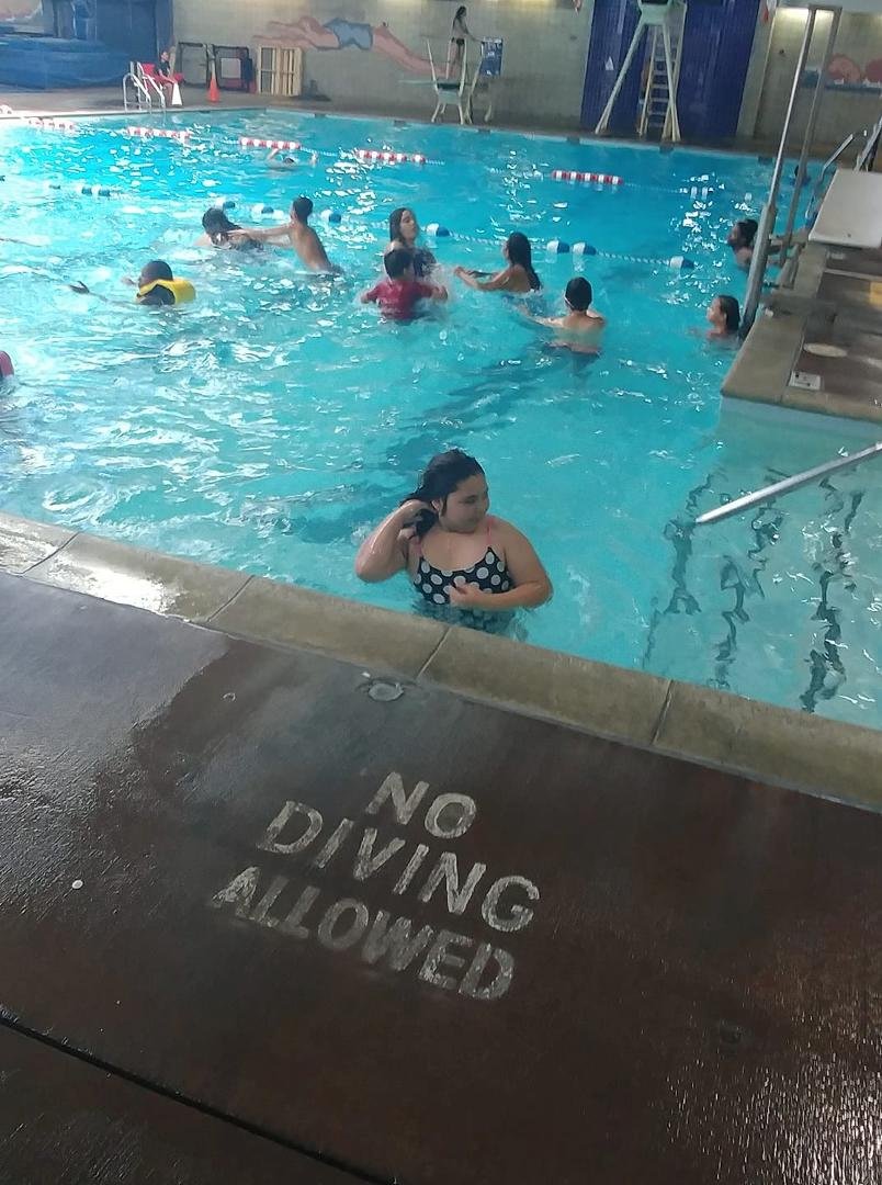 We are at the pool in the neighborhood... Trying to cool off today..
