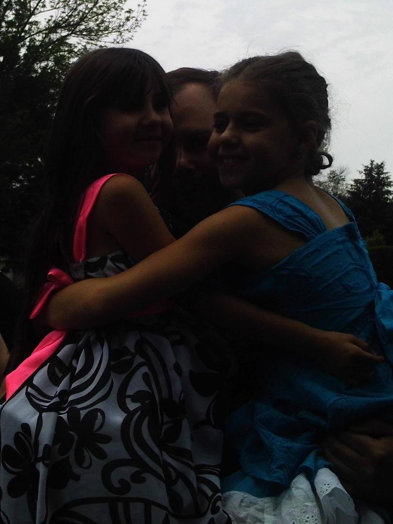 This is not edited.... YES... That is Gabby letting Tom Parkinson hold her.