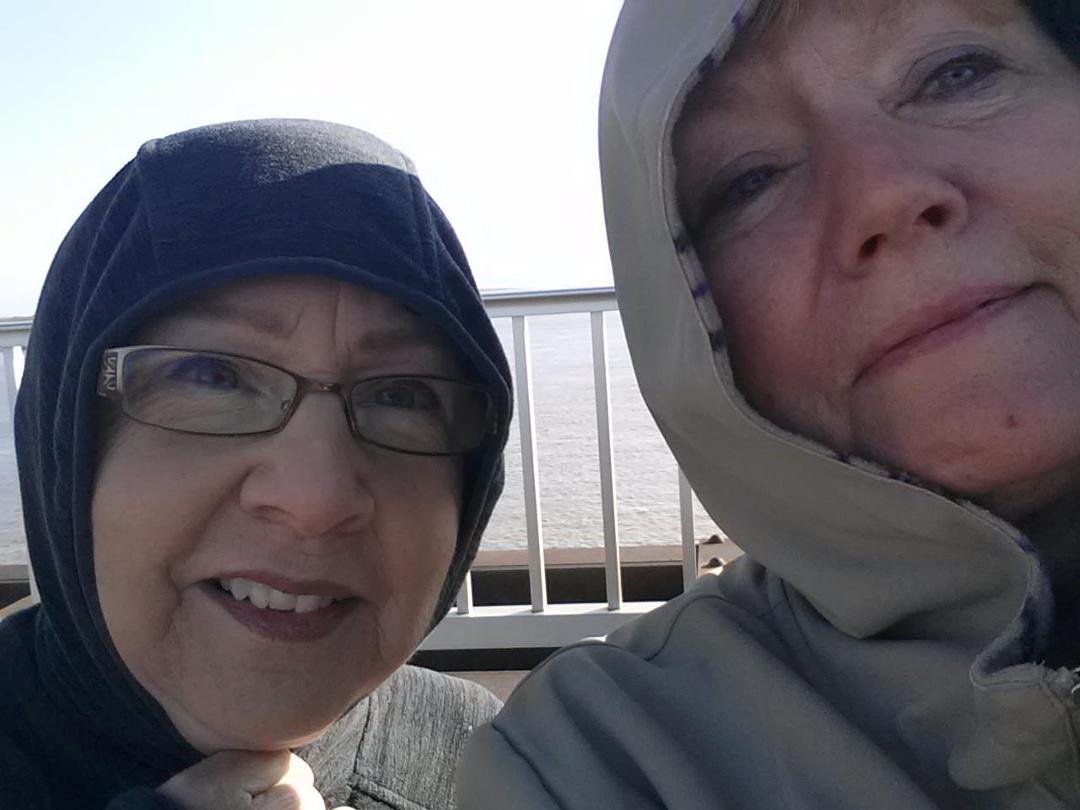 Gail Kriete Jennings and me. The day we walked the bridge and almost from froze from the wind. We are both clutching our hoods. It was sunny but very windy.