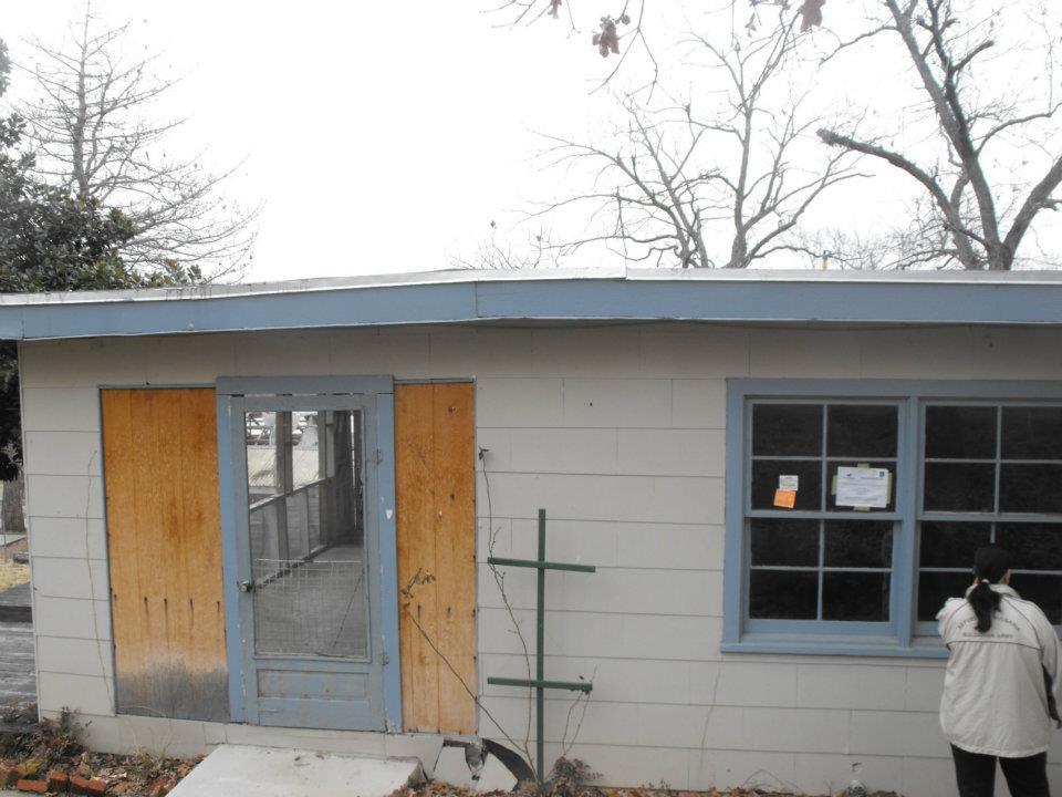 Front of the House. Door replaced by a window. Also another angle of how the original roof line was.