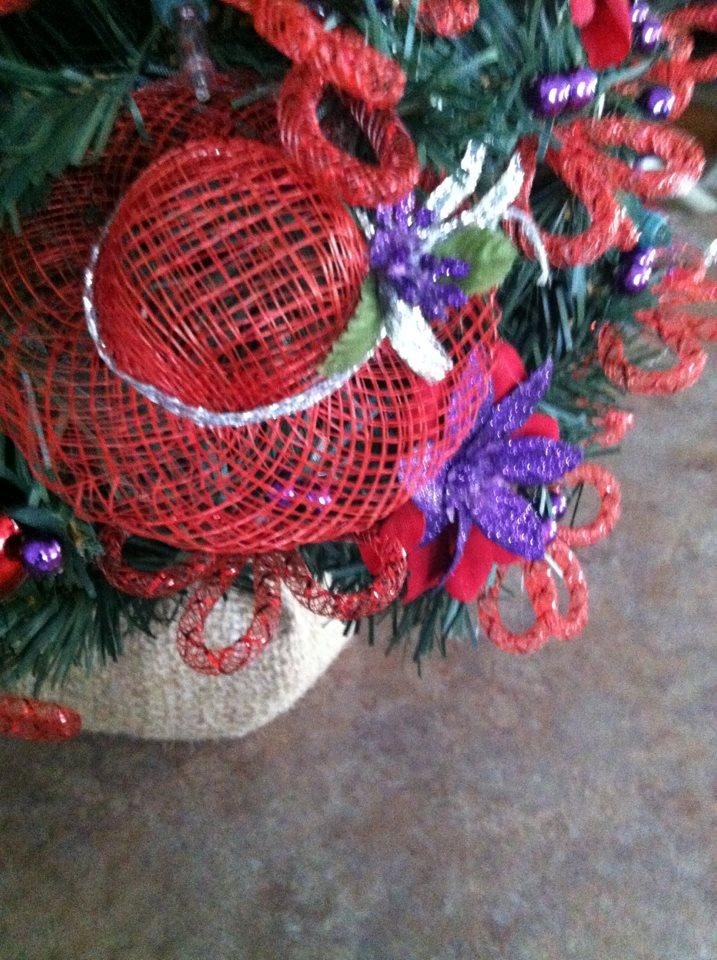 Four of the eight hats on my tree.