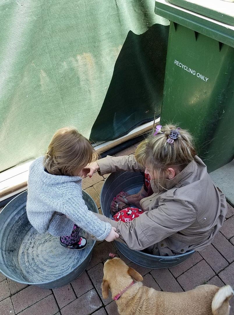 Me and my Great Granddaughter these morning. In a big wash tub
