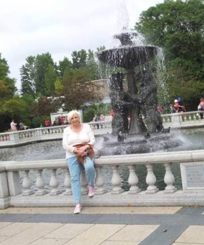 Found it, 2014. Same fountain, just a much older version of the girl in front of it.
