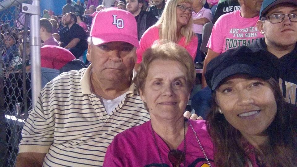Fri. night my beautiful daughter Jennifer and son -in- law Fred invited larry and myself to the football game. Lake Orion verses Oxford. The game was a fund raiser called pink out,for breast cancer. We are wearing the pink