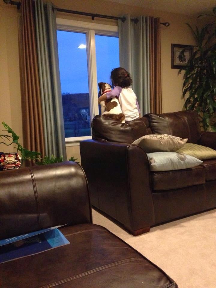 My granddaughter Maddie, and her best friend Rosie looking out the window. I just love this picture, so sweet!