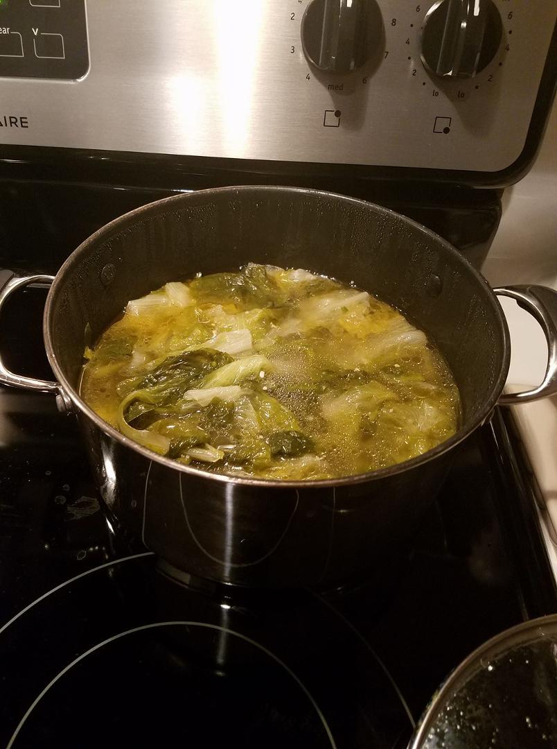 Getting my escarole ready for my Italian wedding soup for tomorrow... I make it today so that tomorrow it is delicious and nice and tight ...and then I add small little Meatballs to it!!